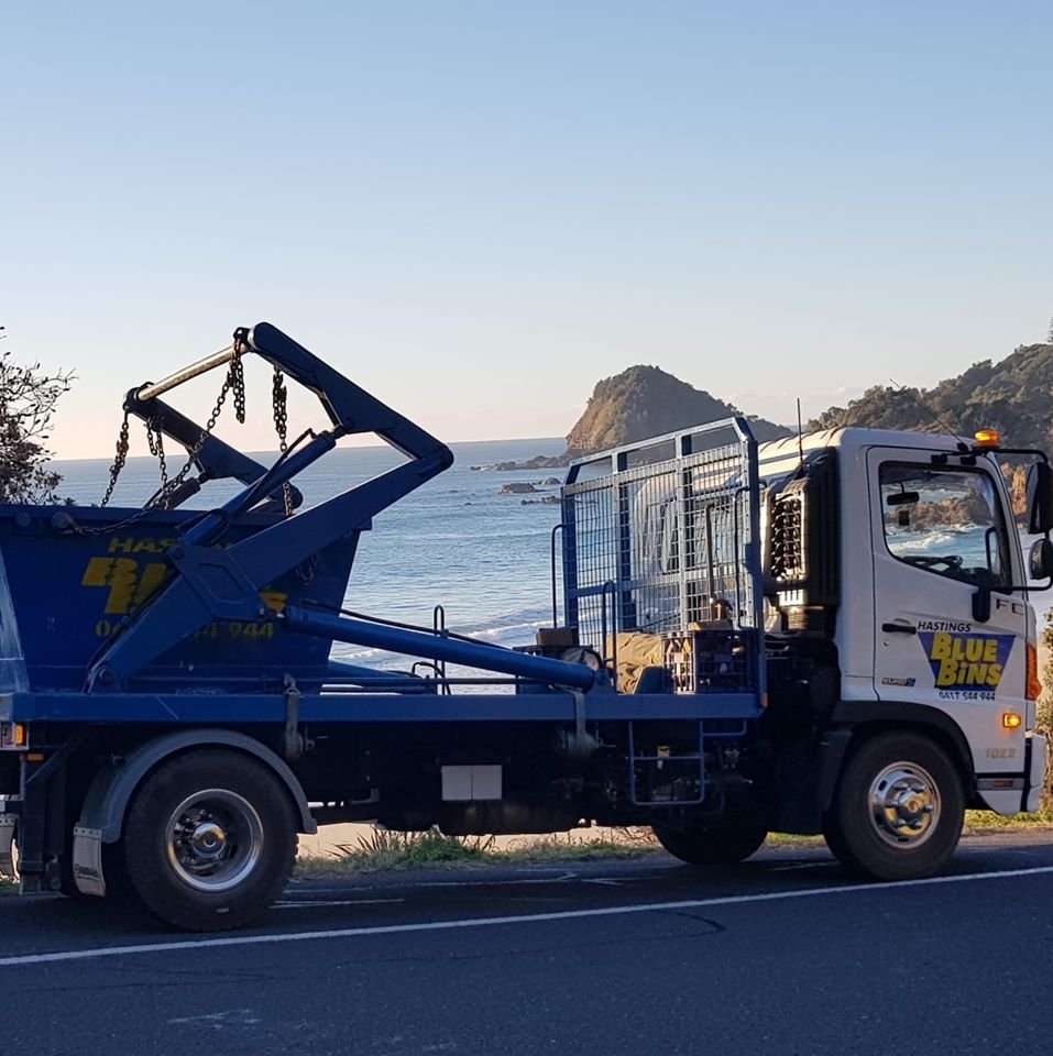 Aus blue bins truck by the beach in port macquarie and forster and taree